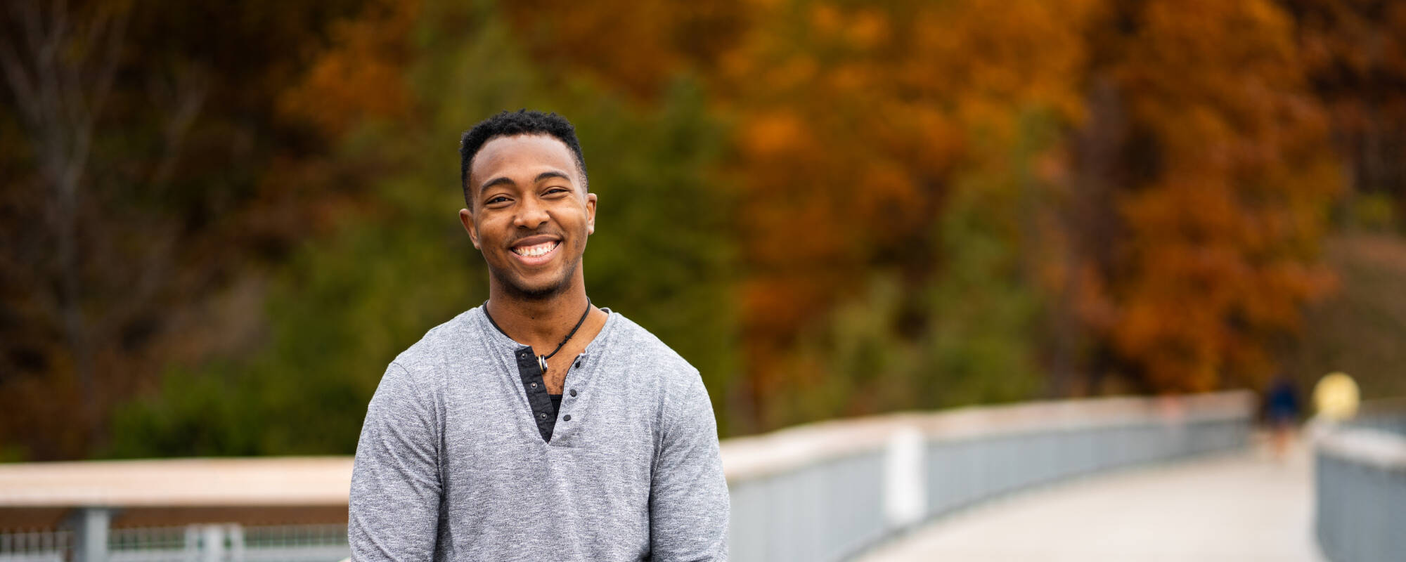 adult student smiling at camera